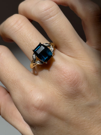 Contemporary blue topaz and diamond cocktail ring on 9ct gold