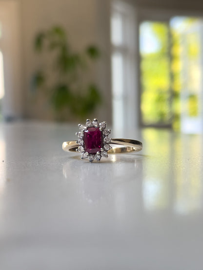 Vintage ruby and diamond halo cluster on 9ct gold