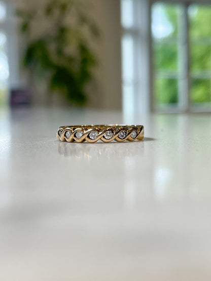 Vintage wavy diamond half eternity ring on 9ct gold