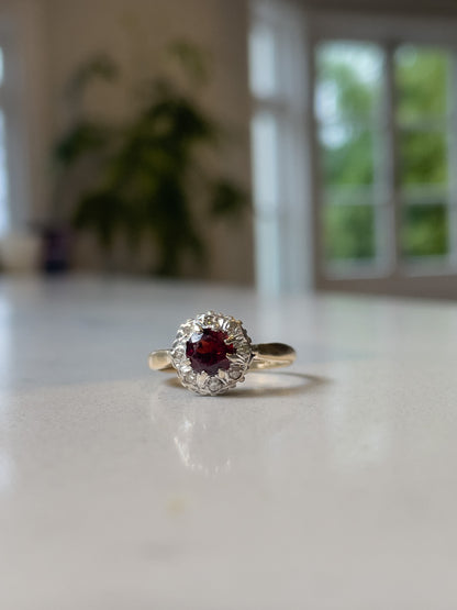 Vintage 1970s garnet and diamond halo cluster ring on 9ct gold