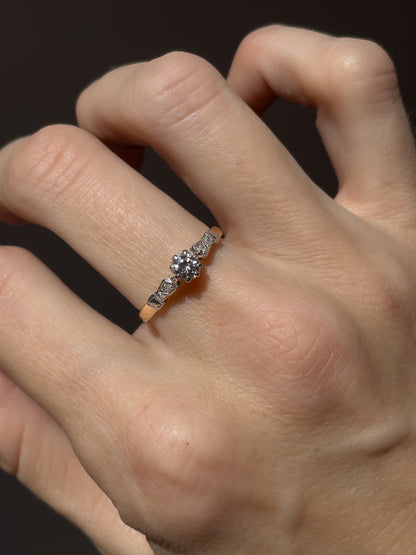 Vintage diamond solitaire ring on 18ct gold and platinum