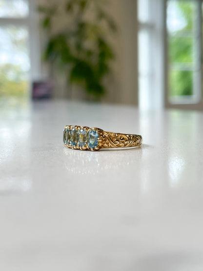 Vintage blue topaz half hoop ring on 9ct gold