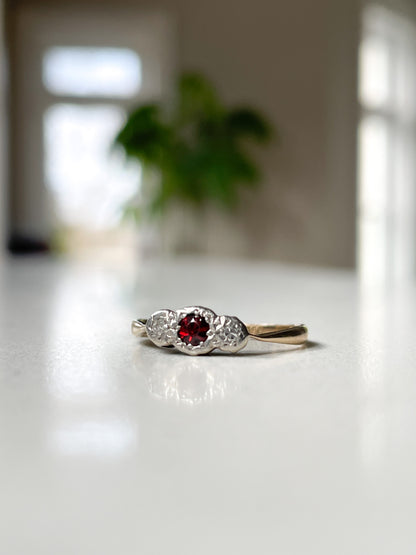 Vintage garnet and diamond trilogy ring