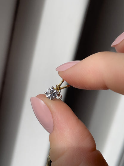 Vintage .25ct diamond solitaire pendant and chain