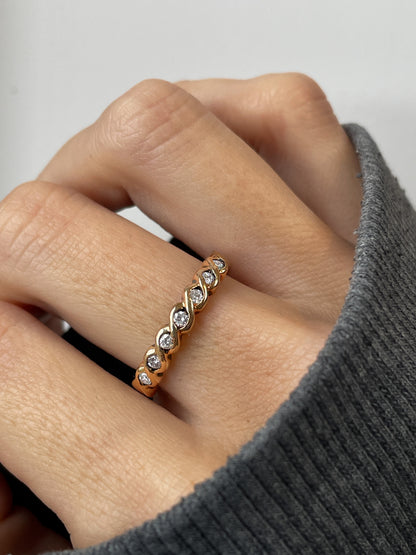 Vintage wavy diamond half eternity ring on 9ct gold