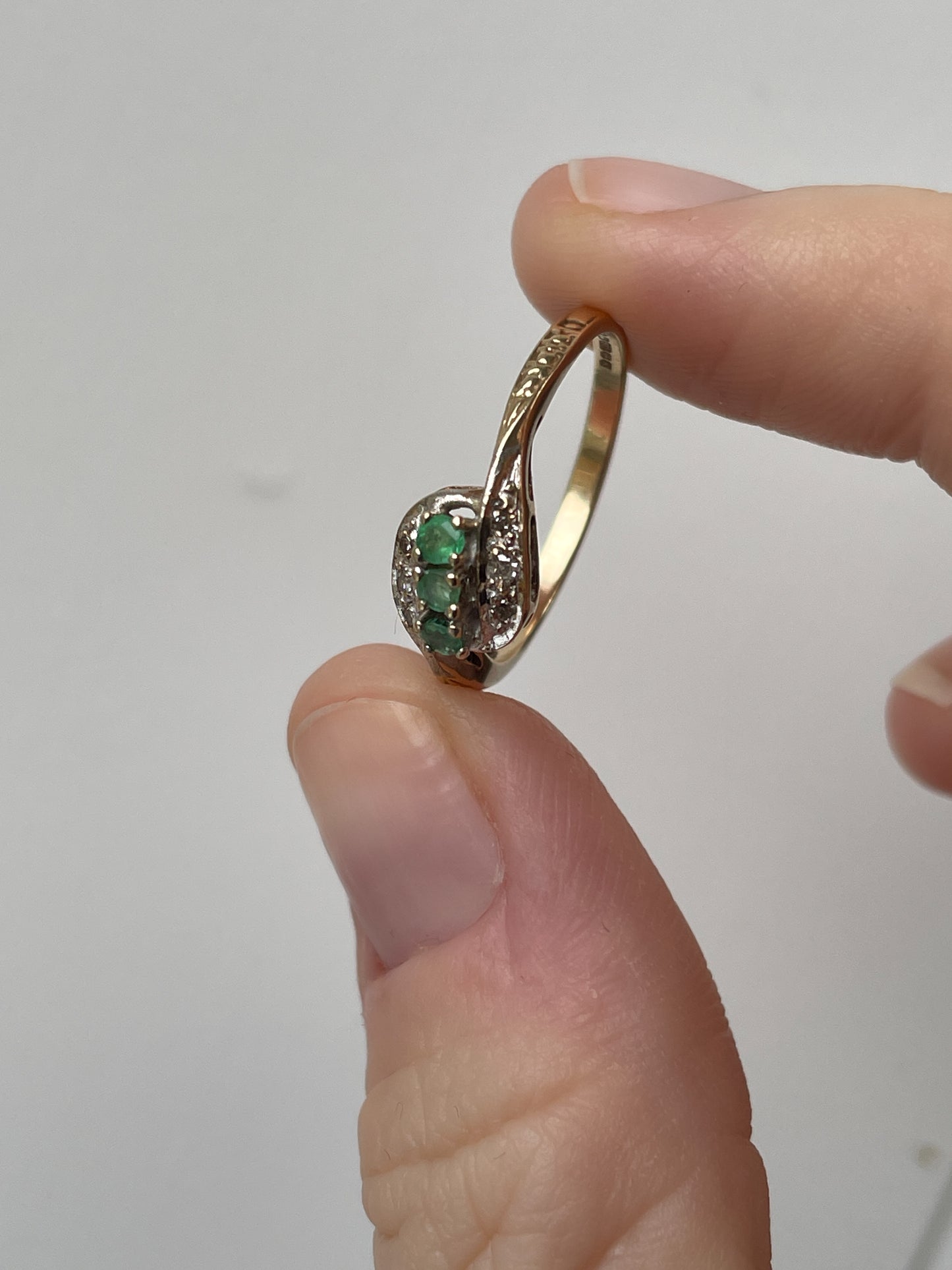 9ct gold emerald and diamond bypass ring from 1982