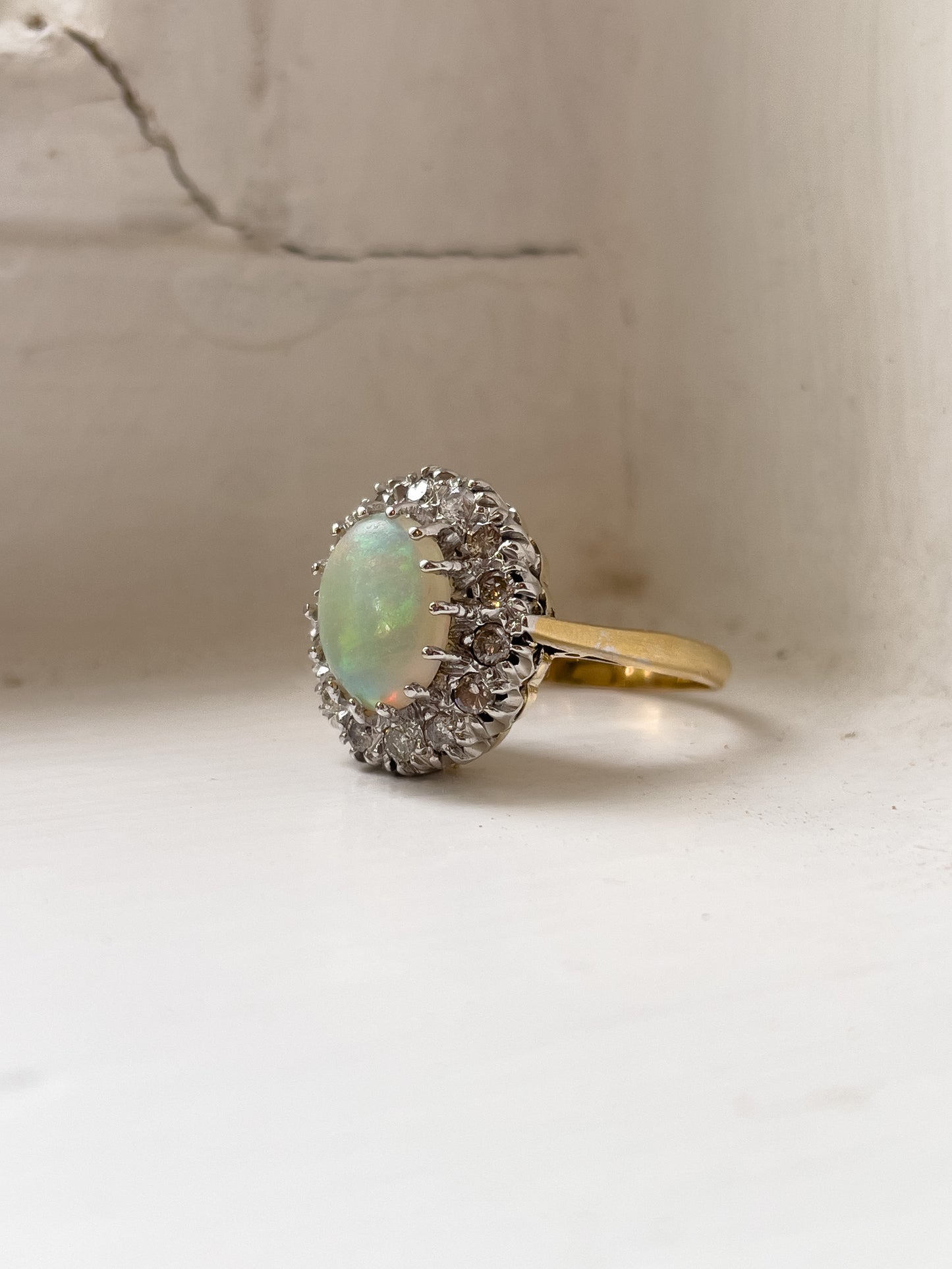 Vintage opal and diamond halo cluster ring on 18ct gold