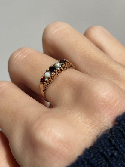 Vintage garnet and seed pearl boat ring on 9ct gold