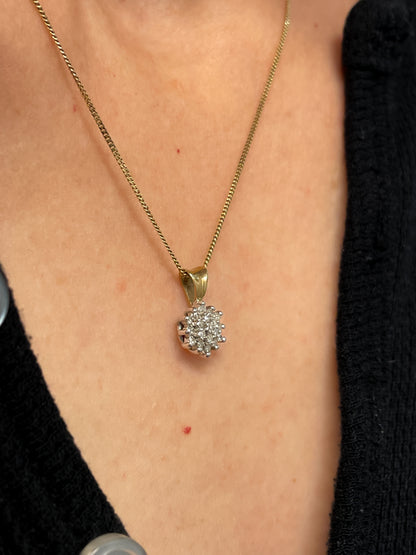 Vintage diamond cluster pendant with 9ct gold chain