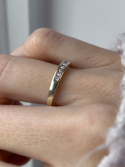 Vintage channel set diamond half eternity ring on 9ct white gold