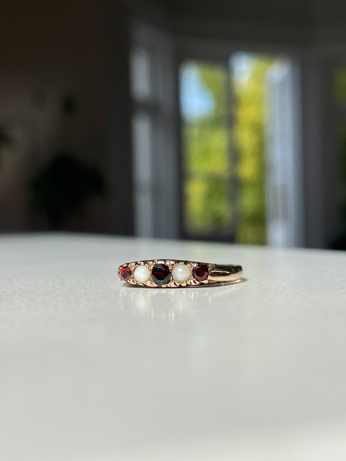Vintage garnet and seed pearl boat ring on 9ct gold