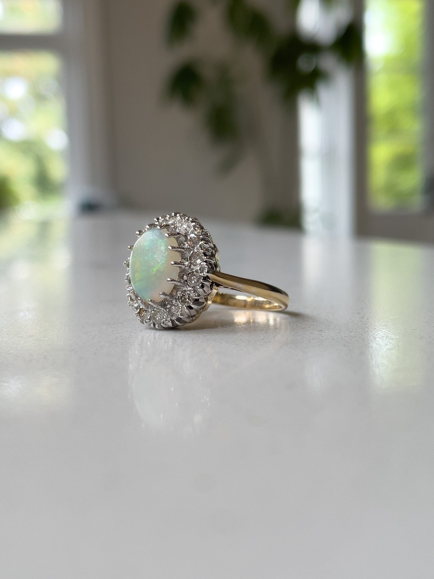 Vintage opal and diamond halo cluster ring on 18ct gold