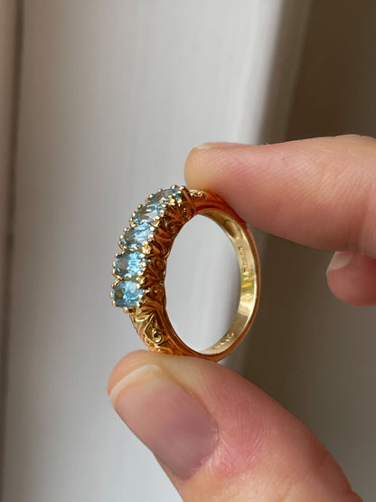 Vintage blue topaz half hoop ring on 9ct gold