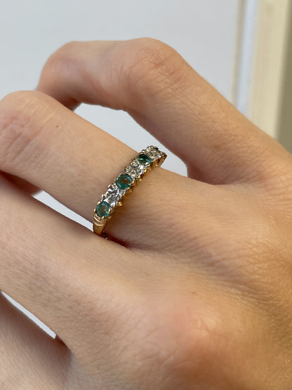 Vintage emerald and diamond half eternity ring on 9ct gold