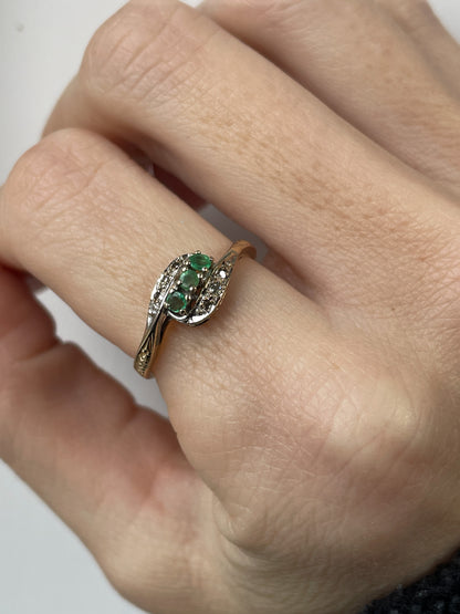 9ct gold emerald and diamond bypass ring from 1982