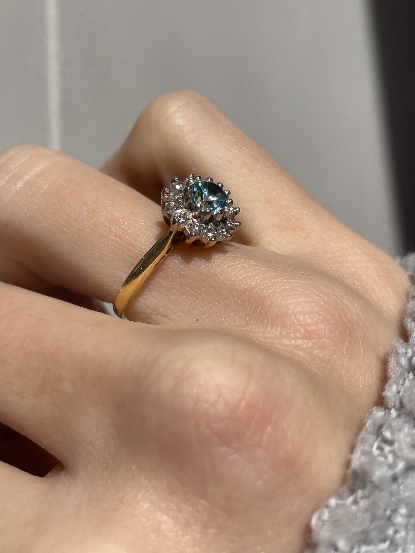 Vintage blue zircon and diamond daisy cluster ring on 18ct gold (with valuation for £1,900)