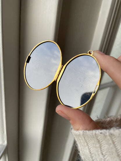 1970s large sterling silver locket with floral design