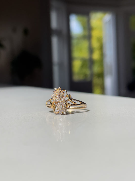 Vintage diamond cluster ring on 9ct gold