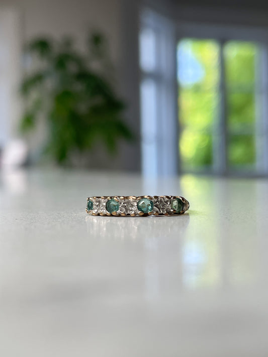 Vintage emerald and diamond half eternity ring on 9ct gold