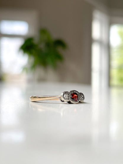Vintage garnet and diamond trilogy ring