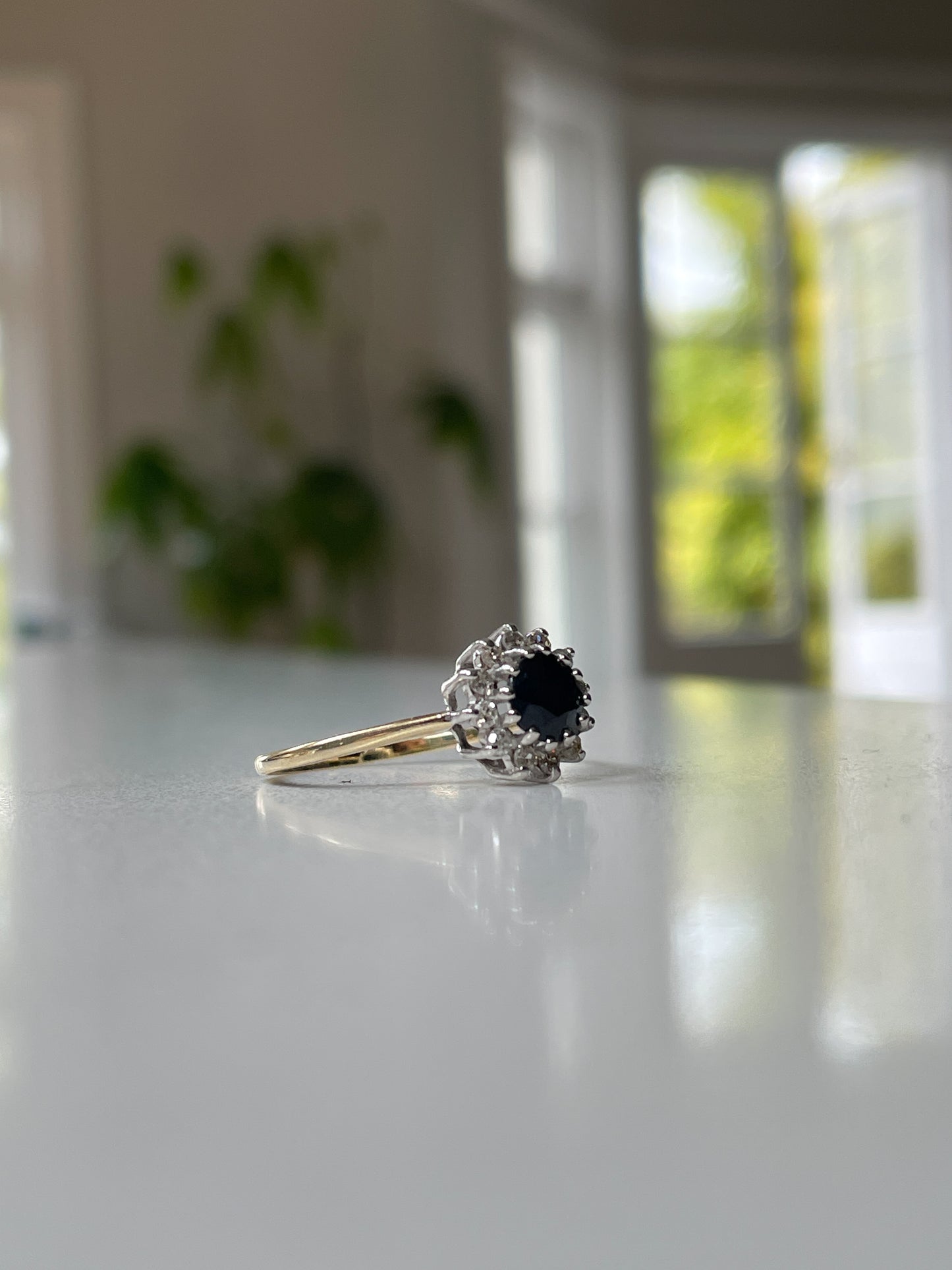 Vintage sapphire and diamond cluster ring on 9ct gold