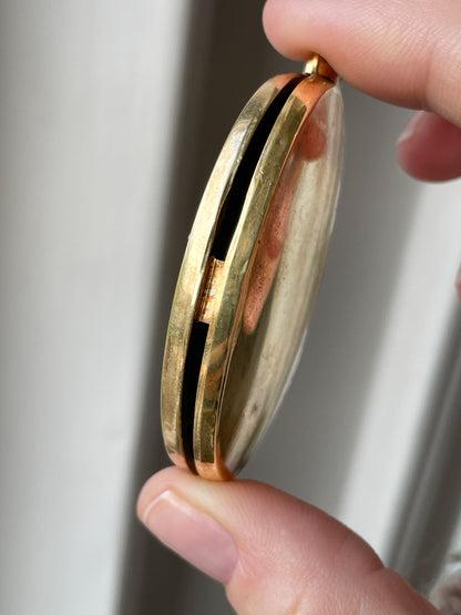 1970s large sterling silver locket with floral design