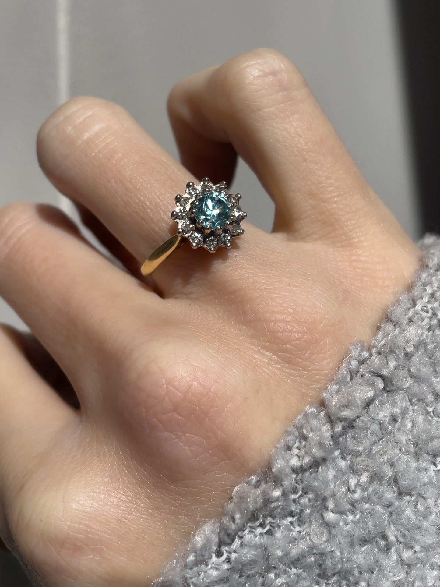 Vintage blue zircon and diamond daisy cluster ring on 18ct gold (with valuation for £1,900)