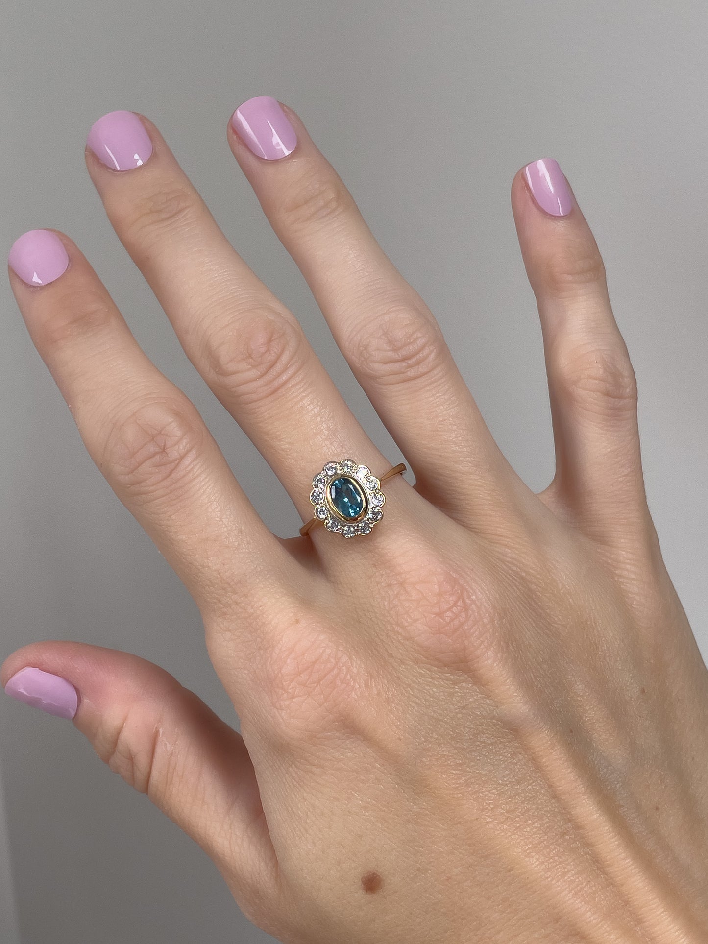 Blue topaz cluster ring on 9ct gold