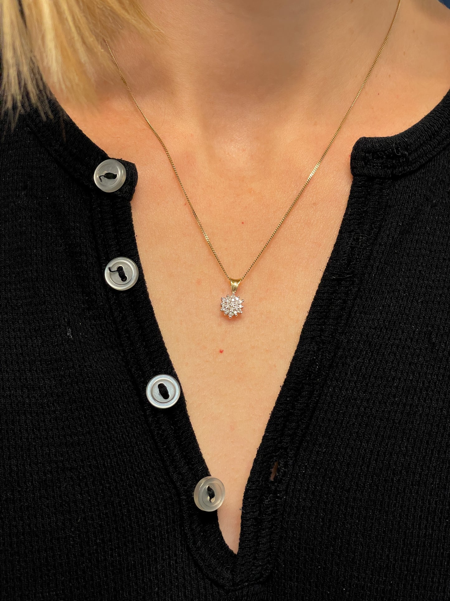 Vintage diamond cluster pendant with 9ct gold chain