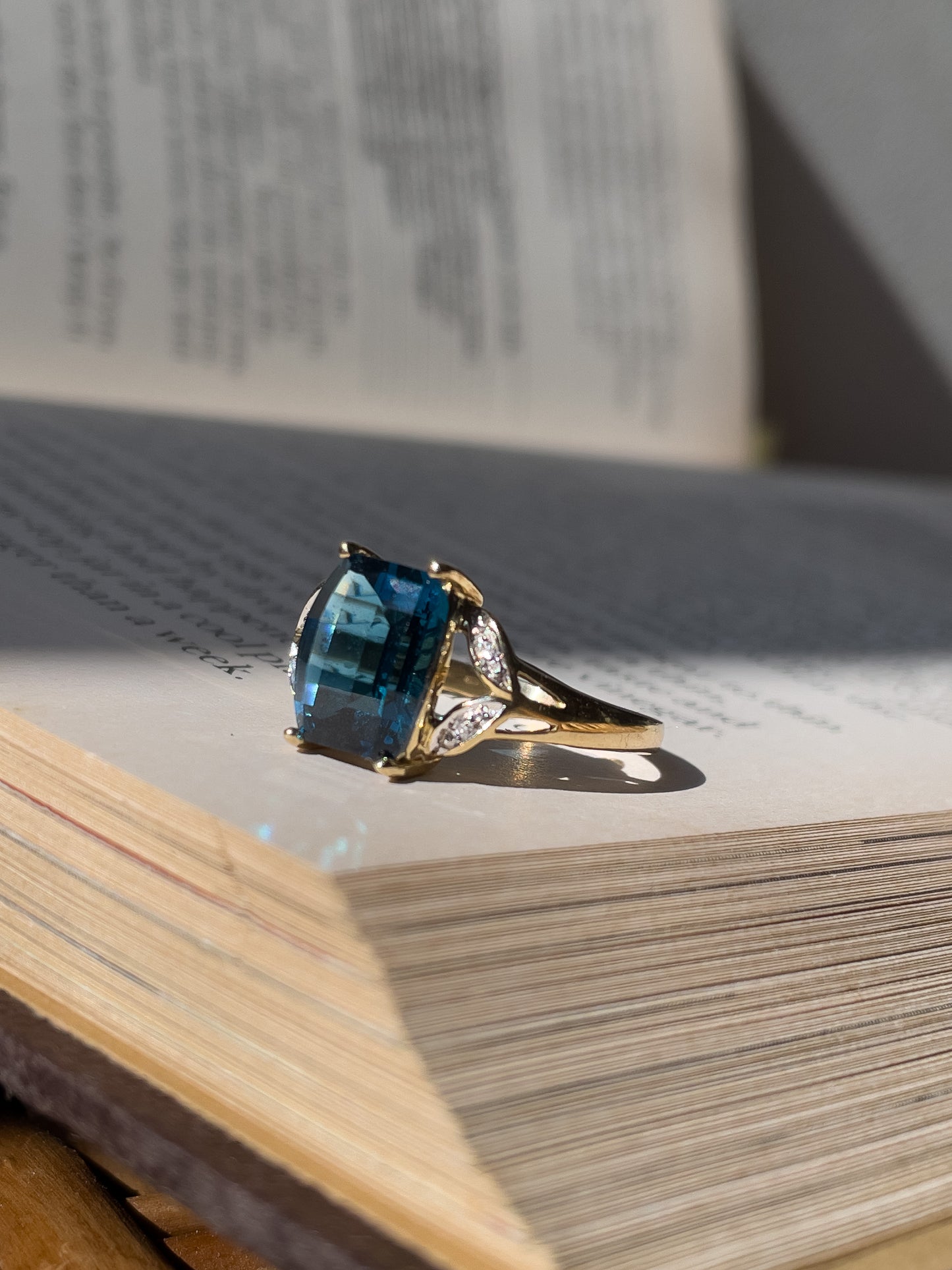 Contemporary blue topaz and diamond cocktail ring on 9ct gold