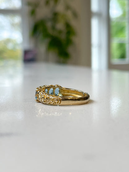 Vintage blue topaz half hoop ring on 9ct gold