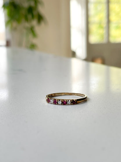 Vintage garnet and diamond half eternity ring