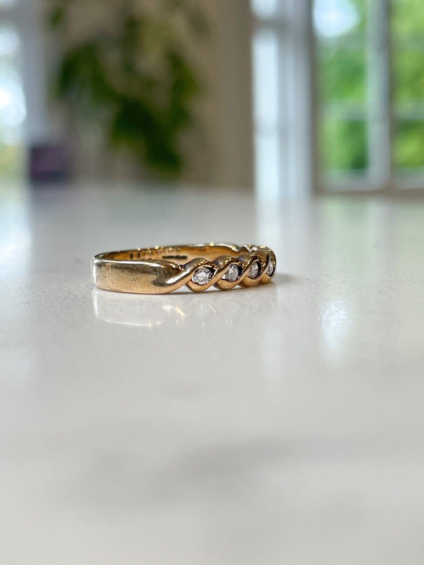 Vintage wavy diamond half eternity ring on 9ct gold