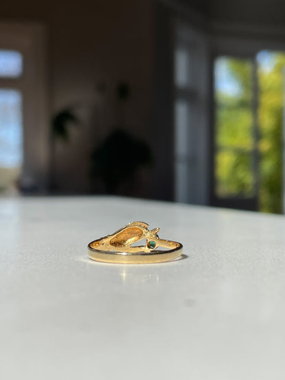 Antique gold hand and emerald ring on 18ct gold
