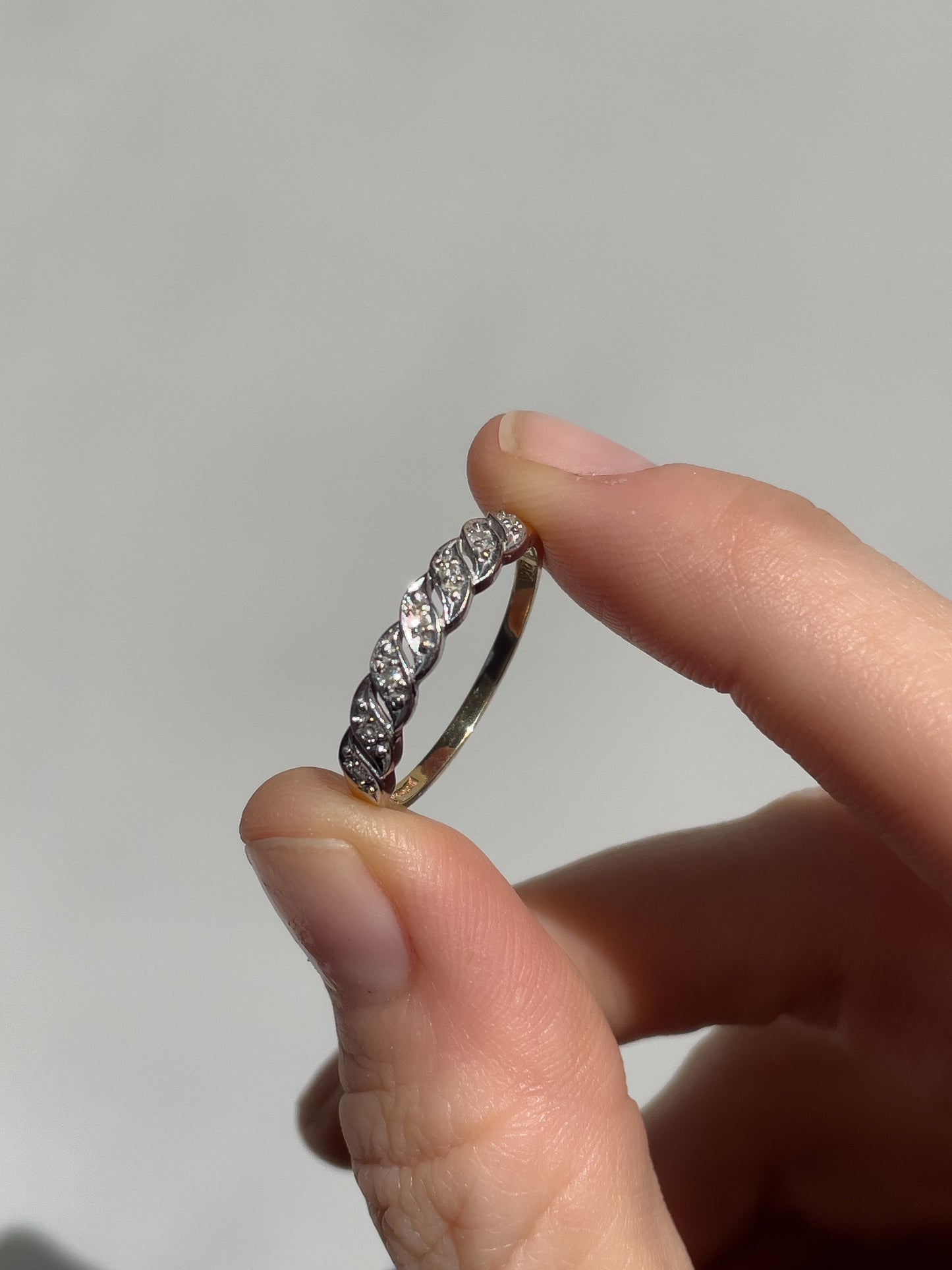 Vintage 'wavy' diamond half eternity ring on 9ct gold