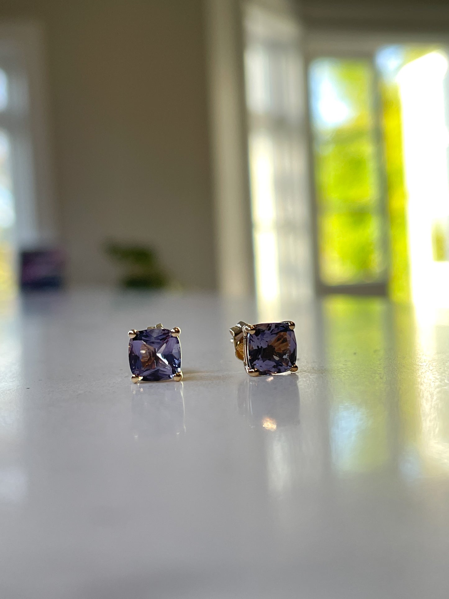 Vintage tanzanite stud earrings on 9ct gold
