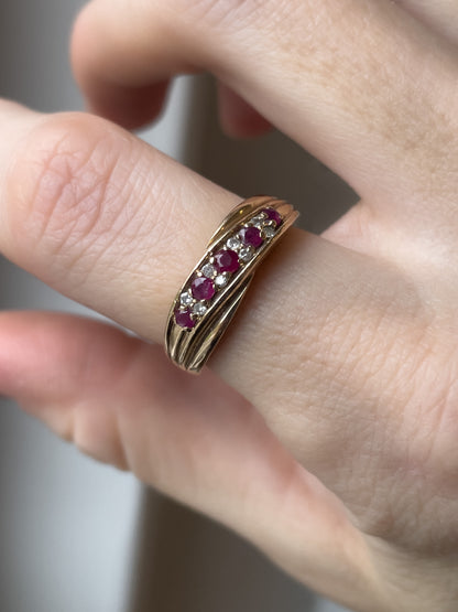 A vintage ruby and diamond crossover band ring on 9ct gold