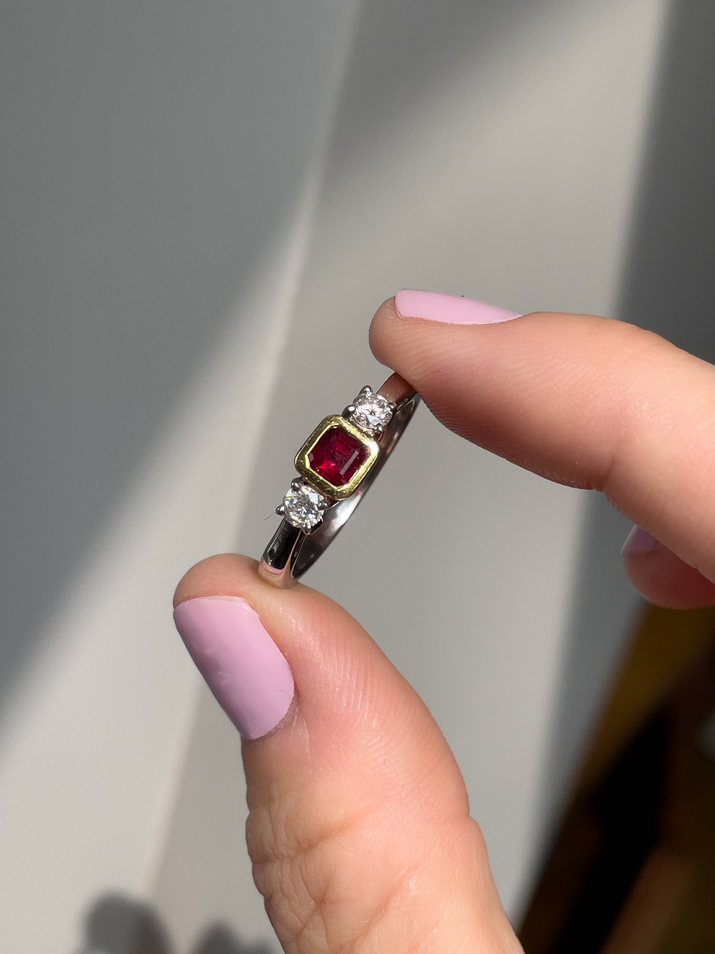 Chunky garnet and diamond trilogy ring on 18ct gold