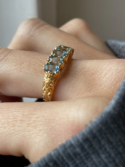 Vintage blue topaz half hoop ring on 9ct gold