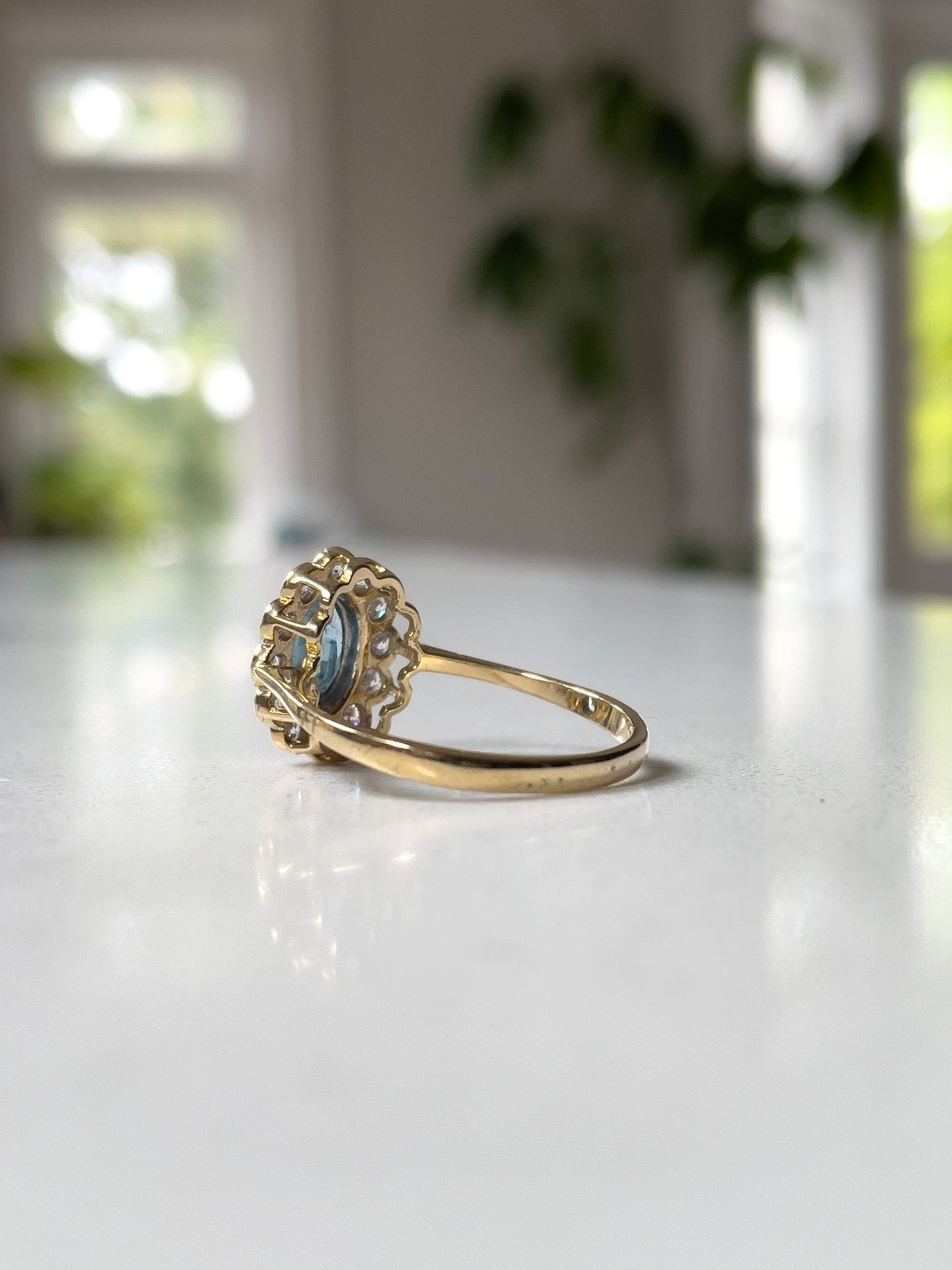 Blue topaz cluster ring on 9ct gold