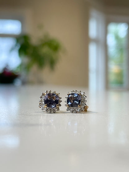 Tanzanite and diamond halo stud earrings on 9ct gold