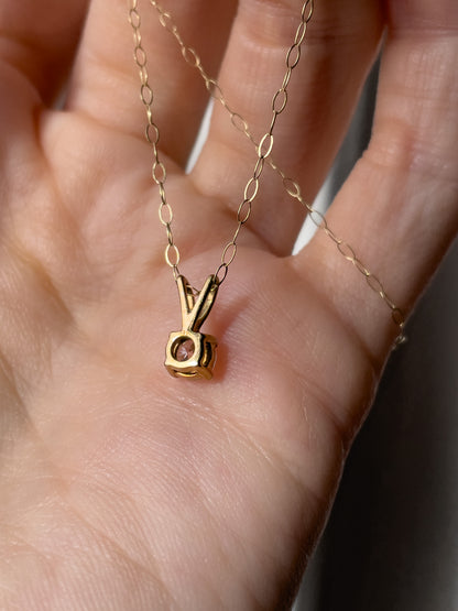 Vintage .25ct diamond solitaire pendant and chain