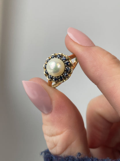 1960s Pearl and sapphire halo ring on 18ct gold