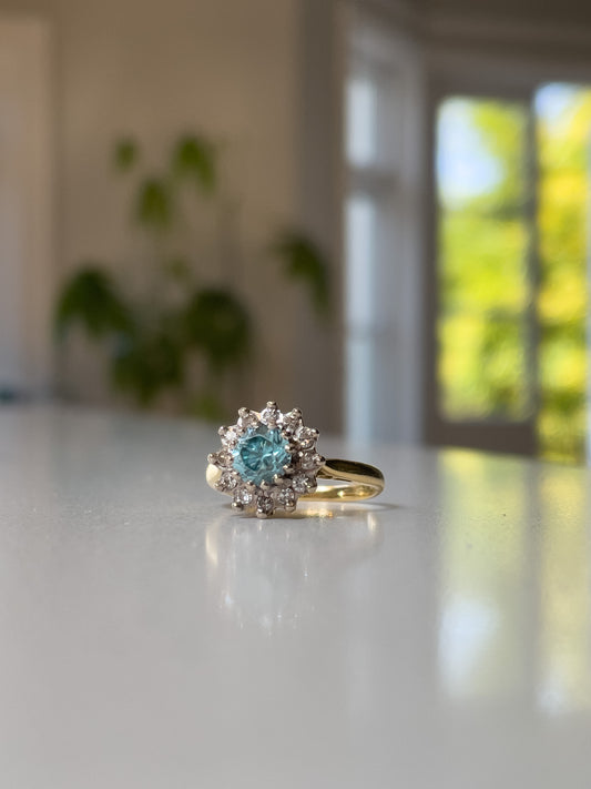 Vintage blue zircon and diamond daisy cluster ring on 18ct gold (with valuation for £1,900)