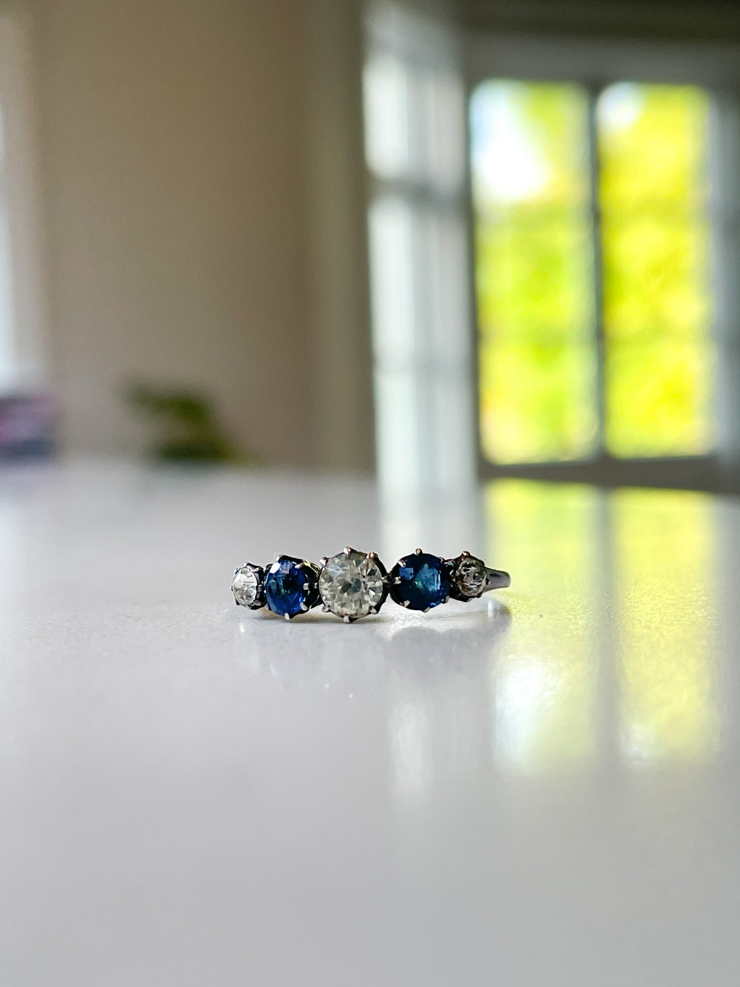 Antique blue and white paste ring on 9ct white gold