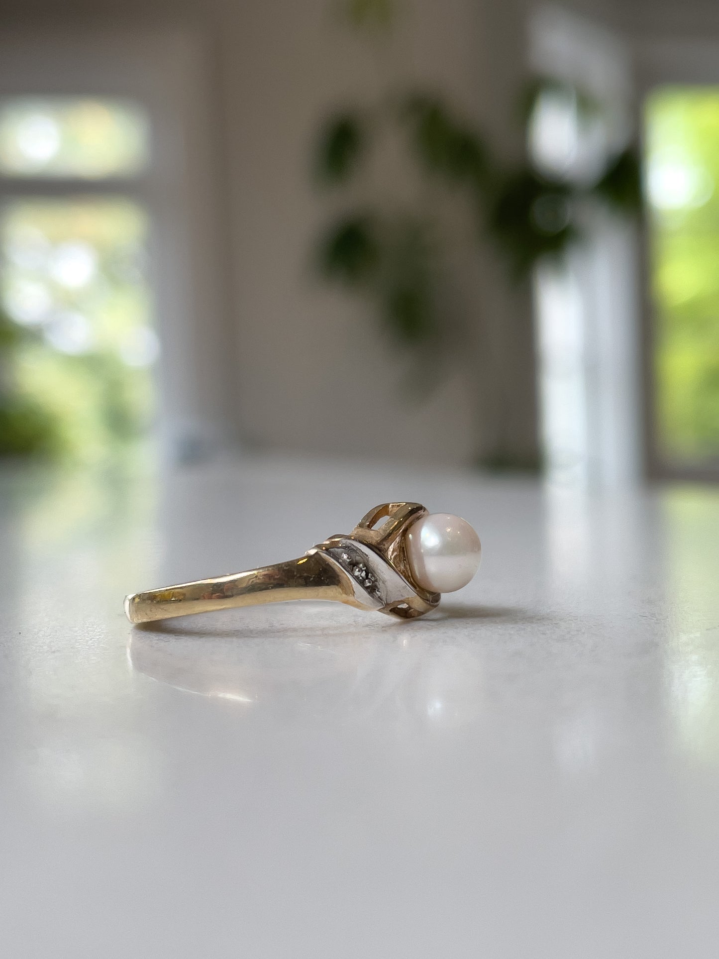 Vintage pearl and diamond ring on 9ct gold