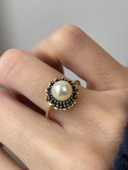 1960s Pearl and sapphire halo ring on 18ct gold