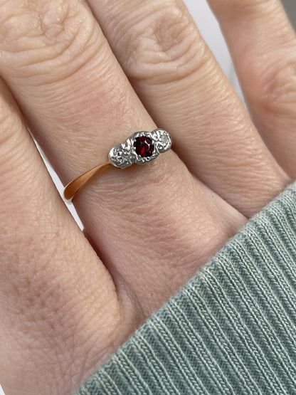 Vintage garnet and diamond trilogy ring