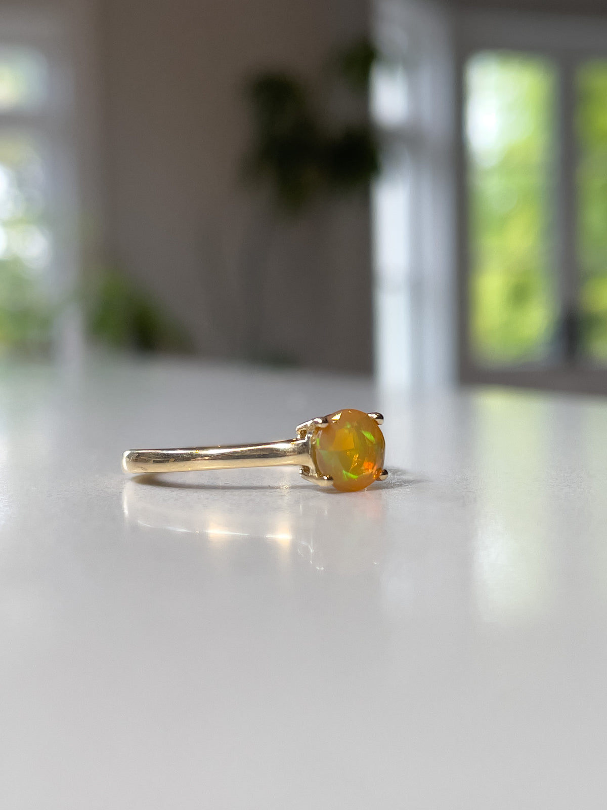 Orange opal solitaire ring