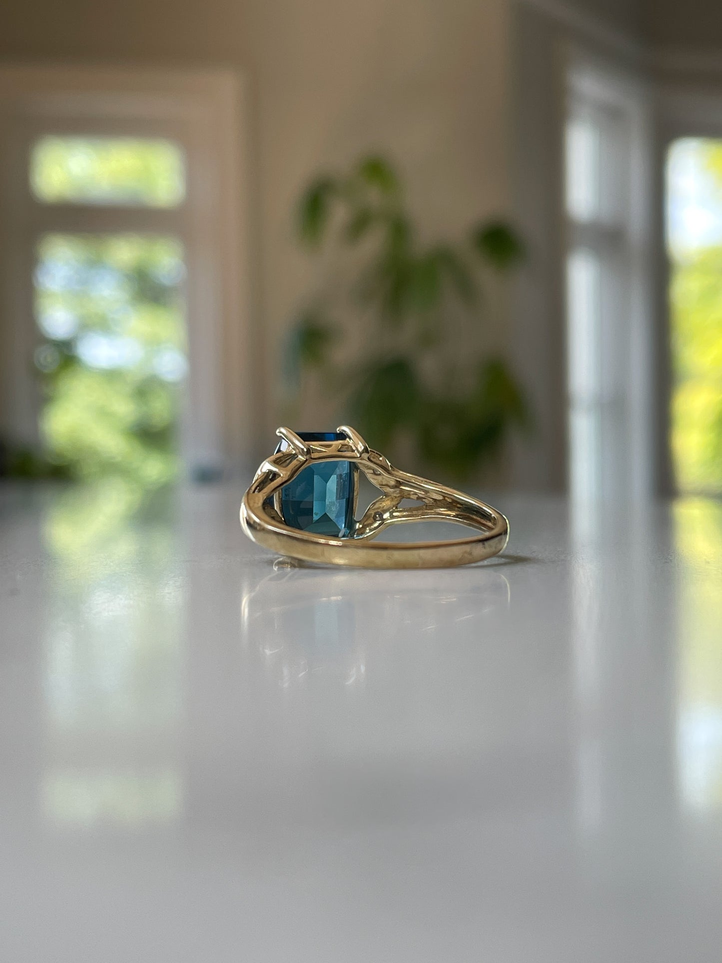 Contemporary blue topaz and diamond cocktail ring on 9ct gold